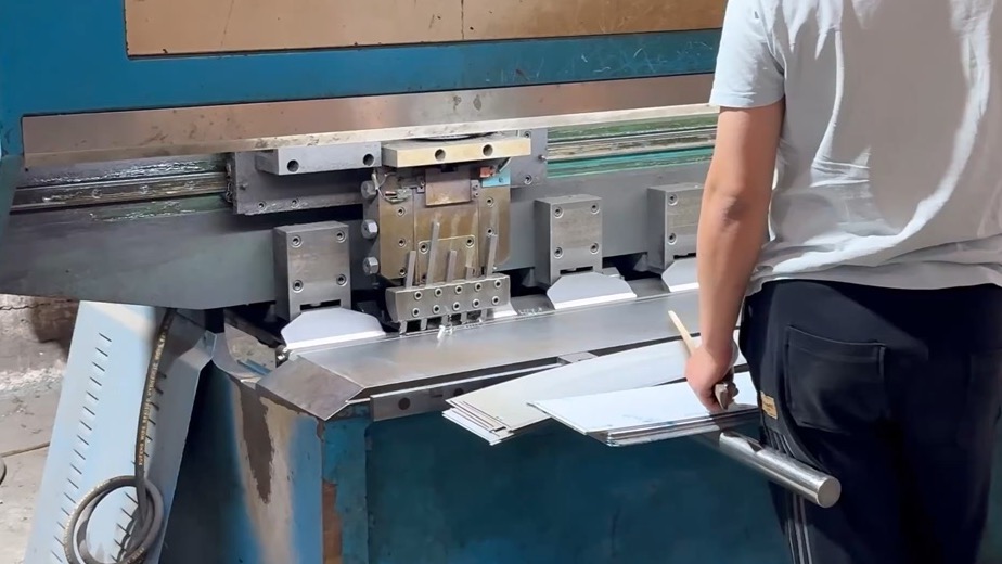 Sheet metal bending machine in operation at the Foshan workshop
